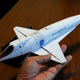 Illustration for article titled Japanese craftsman creates perfect sci-fi ship replicas using just paper